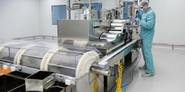 Revolutionizing Industrial Efficiency: The Role of Shrink Wrapping Machines, Dust Collectors, and Screw Conveyors